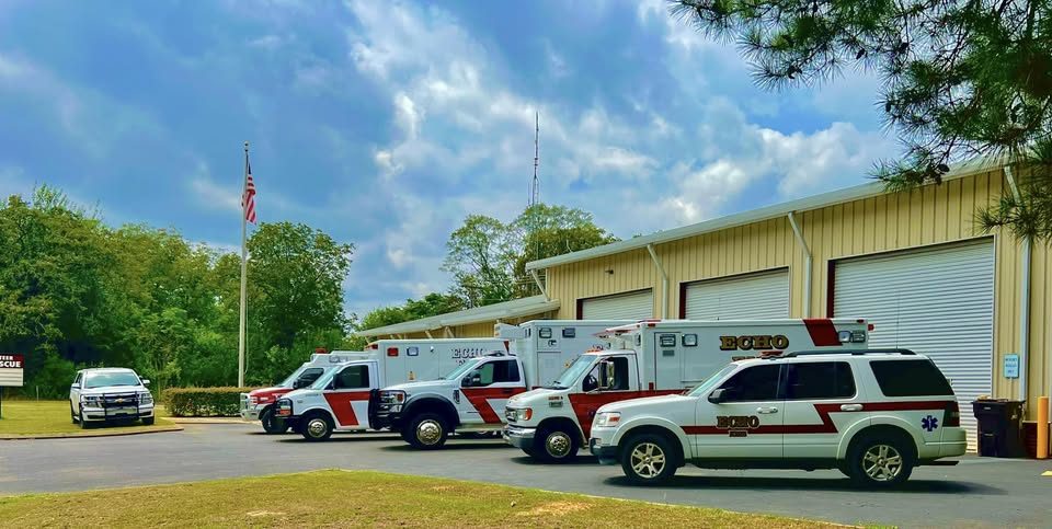 Echo EMS fleet lined up outside the station